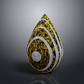 Shiny Teardrop Shaped Decorative Piece With Yellow White Spiral Patterns And Circular Ornament