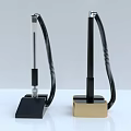 Modern Desk Pen With Black Gold Base Metal Body Coiled Cable On White Surface