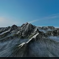 Majestic Snowy Mountain Peaks With Sunrise Light And Misty Valleys In Scenic Range