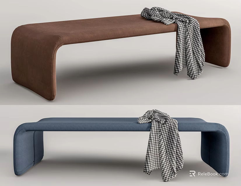 Brown And Blue Upholstered Ottoman With Black And White Checkered Blanket 3d model 