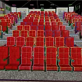 Spacious Cinema Interior With Red Theater Seats Arranged In Neat Rows