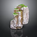Stacked Rock Landscape Feature With Green Moss And Natural Textured Design
