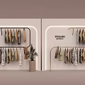Original Design Hangers with Clothes and Potted Plant in FRAME Store