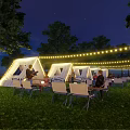 Garden Landscape At Night With White Tents String Lights And People Sitting On Grass
