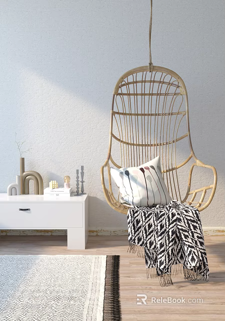 Stylish Rattan Hanging Chair With Decorative Pillow And Blanket By White Side Table 3d model 