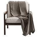 Modern Accent Chair With Wooden Frame Light Gray Cushion And Dark Textured Blanket