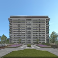 Modern High Rise Residential Building With Green Lawn Purple Flowers And Trees