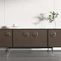 Modern Brown TV Stand with Circular Knobs Metal Legs and Potted Plant on Wooden Floor