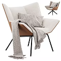 Modern Beige Fabric Leisure Chair With Textured Pillow Fringed Blanket And Black Metal Legs
