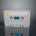 White Cassette Tape With Yellow Label Blue Square And M I Record