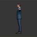 Man in Blue Suit Standing with Arms Outstretched Against Gray Background