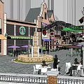 Vibrant Commercial Street With Shops Cafes Outdoor Seating And Decorative Buildings