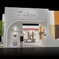 Modern White Exhibition Booth With Green Plant Display Panels And Lighting