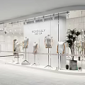 MOVOIUY Modern Clothing Store With Mannequins Clothing Displays And Bright Interior