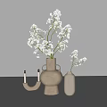 Minimalist Beige and White Ceramic Vases with Flowers and Candle Holder on White Tabletop