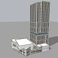 Modern High Rise Office Building With Glass Curtain Wall And Adjacent Low Rise Facilities