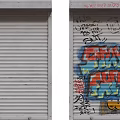 Vibrant Graffiti Art Covering Closed Roller Shutter In Urban Street