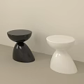 Modern Black and White Side Tables with Unique Curved Base and Round Top Design