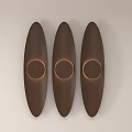 Three Oval Brown Wooden Wall Lights With Round Light Source On Light Wall 3d model