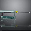 Blue Green Plastic Injection Tool With Yellow Component Cylindrical Handle And Metal Tip