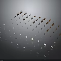 Multiple Orange And White Water Transport Vehicle Models Arranged On Gray Background