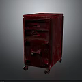 Vintage Red Cabinet With Three Drawers And Wheels On Dark Background