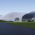Streamlined Modern Architectural Design With White Grid Exterior Grassland Surroundings And Urban Backdrop