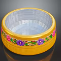 Yellow Decorative Bowl With Colorful Floral Patterns And Green Leaves On Edge