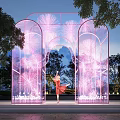 Garden Ornament With Arched Pink Lighting Effects And Dancer In Nighttime Garden