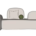 Modern White Sectional Sofa With Curved Design Soft Cushions And Green Decorative Ball