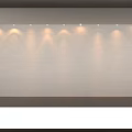 White Wall With Row Of Overhead Lights Creating Light Spots In Modern Display Space