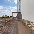 Restaurant Outdoor Terrace Featuring Wooden Flooring Arranged Tables Chairs White Walls River View Blue Sky