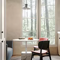 Modern Minimalist Restaurant Featuring Round White Table Fruits Magazine Pink Black Chairs Large Windows Trees