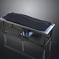 Sturdy Metal Frame Massage Table With Black Padded Top And Lower Storage Shelf