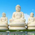 Three Buddha stone sculptures outdoor by pond with lotus and blue sky