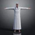 A Man In Traditional White Robe And Headscarf Standing With Arms Outstretched Against Gray Background