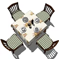 Traditional Dining Table Set With Floral Tablecloth Four Chairs Tableware Wine Bottle And Candles
