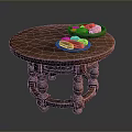 Freshly Prepared Sausages and Bread on Round Wooden Table with Two Plates