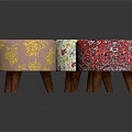 Decorative Ottoman Stools With Three Different Floral Patterns And Wooden Legs 3d model