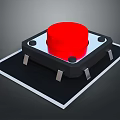 Red Circular Button With Black Base And Metal Pins As Essential Household Electronic Item
