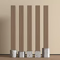 Five Brown Columns With Gray Stone Bases Against Beige Wall And Brown Floor