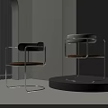 Modern Dining Chairs With Sleek Metal Frames And Brown Leather Seats In Minimalist Interior Design