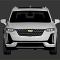 Silver Cadillac SUV With Black Roof And Sleek Modern Exterior Design