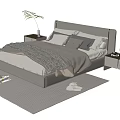 Modern Double Bed With Beige Bedding Bedside Tables Slippers And Magazine On Rug