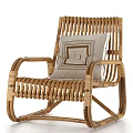 Rattan Rocking Leisure Chair with Neutral Cushion and Geometric Pattern Design