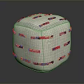 Light Colored Decorative Cube Cushion With Colorful Braided Stitches And Patterned Design 3d model
