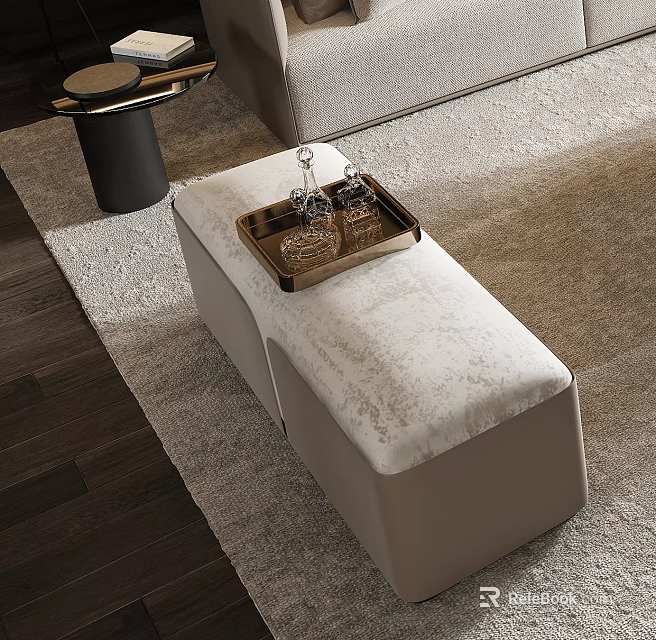 Beige Velvet Ottoman With Gold Tray And Wine Glasses On Textured Living Room Rug 3d model 