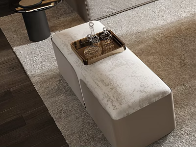 Beige Velvet Ottoman With Gold Tray And Wine Glasses On Textured Living Room Rug 3d model