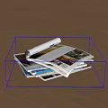 Open Books and Magazines with Colorful Images on Wooden Floor