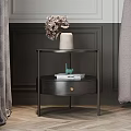 Modern Black Nightstand With Metal Frame Round Top And Floral Vase Books On Wooden Floor